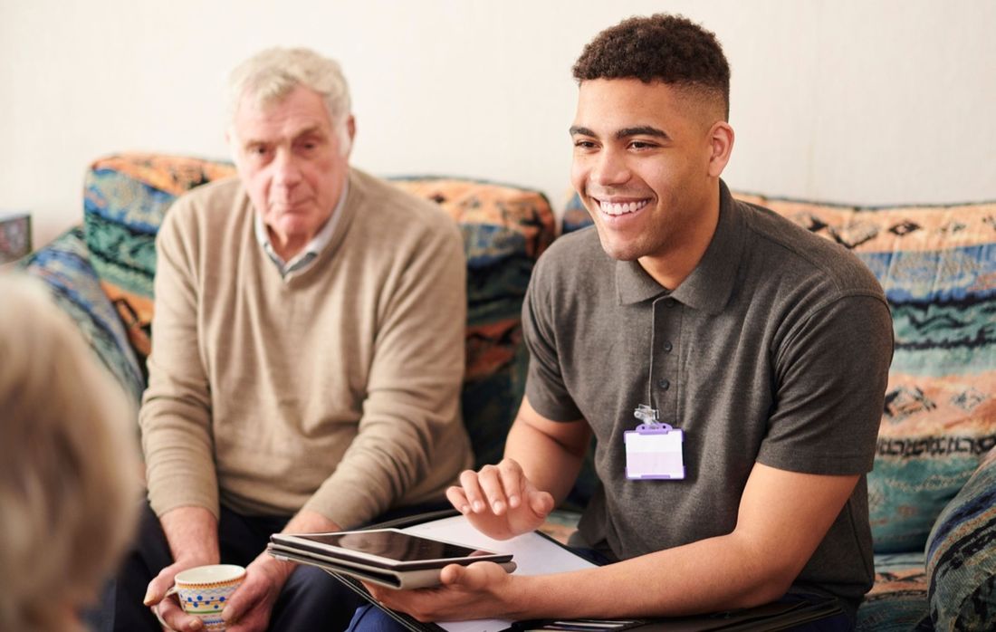 A support worker with an aged care client